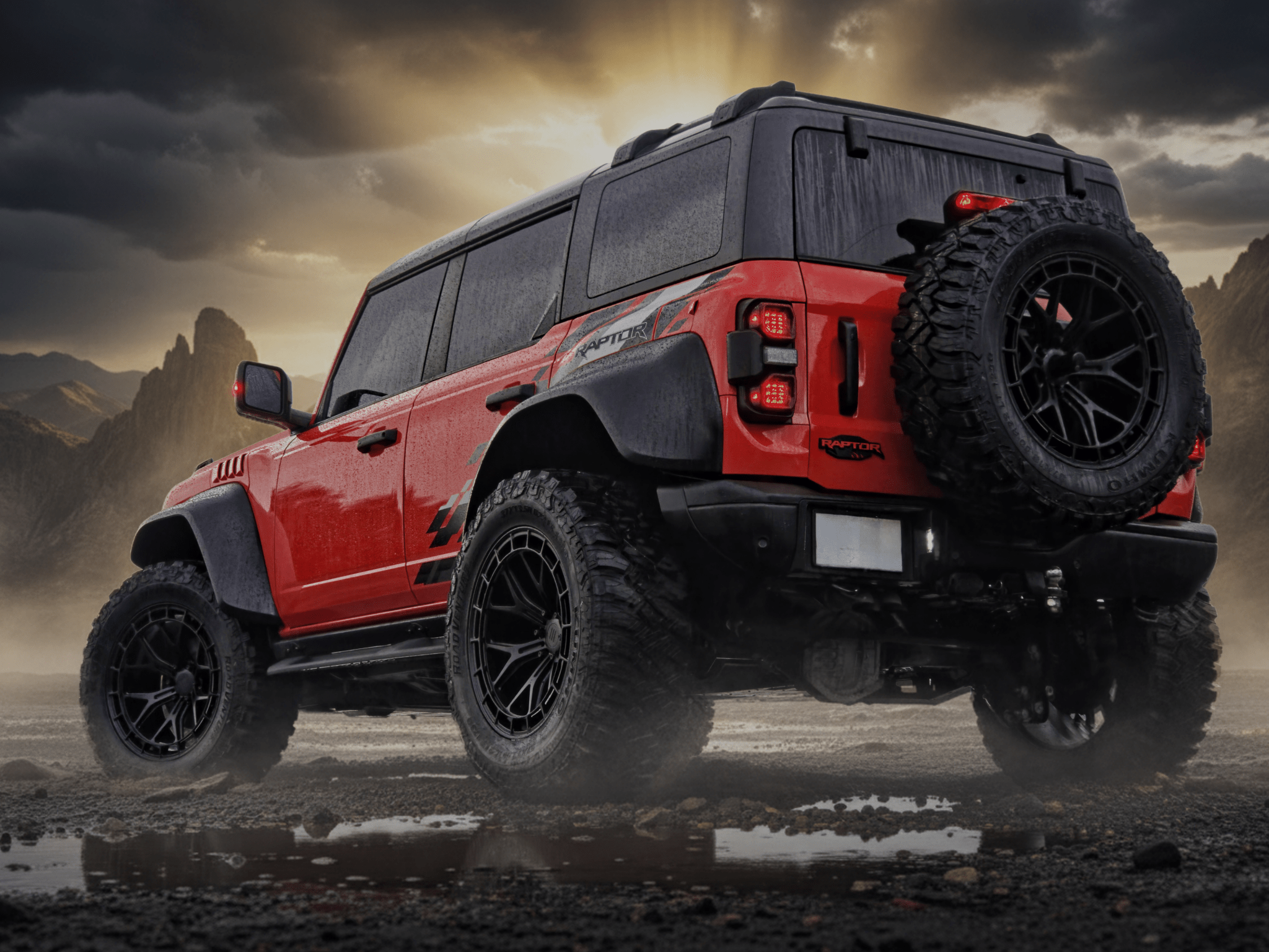 Red off-road vehicle on a rocky terrain with a dramatic sky